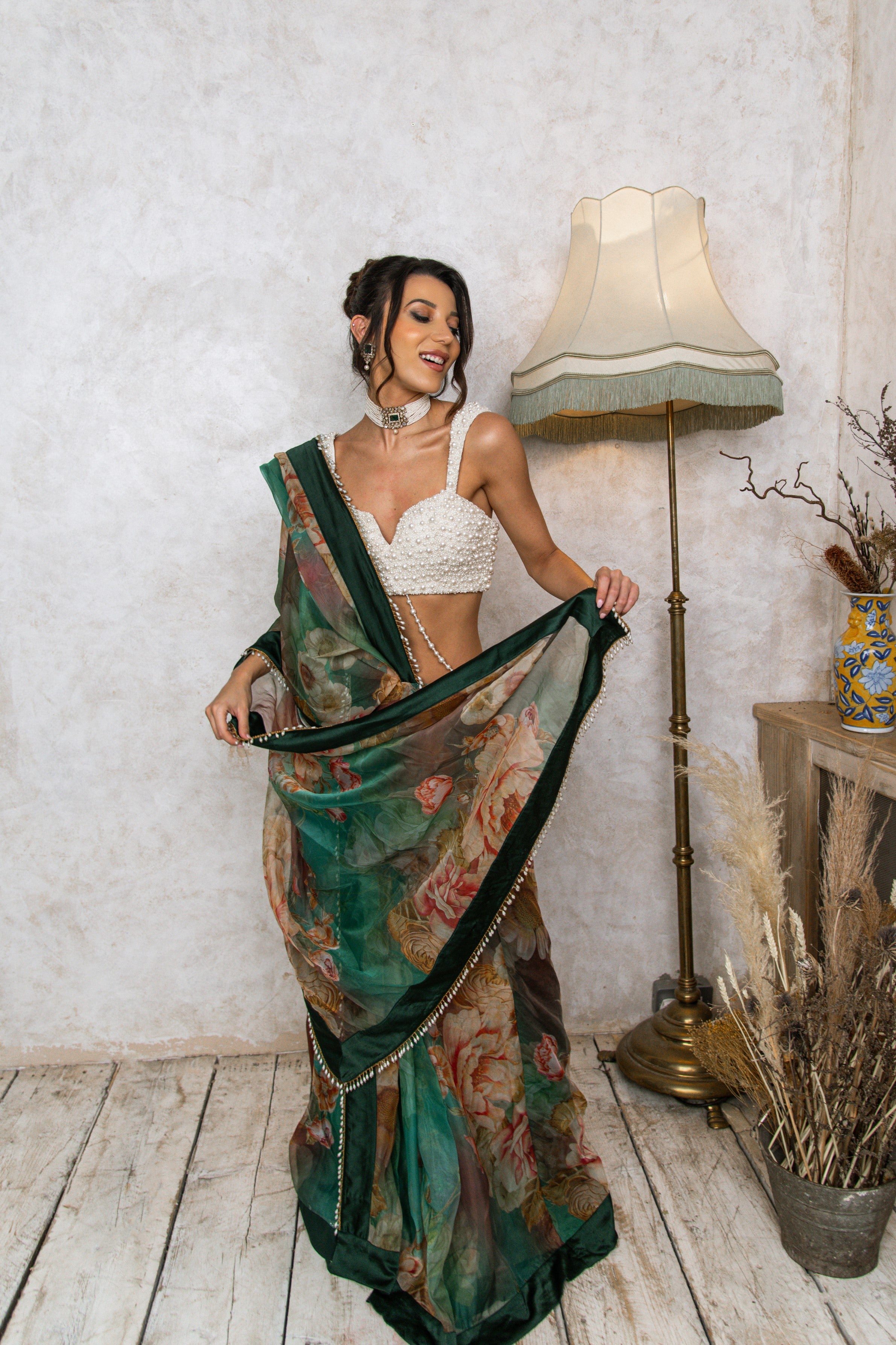 Green floral saree brings in the spring flair. | Elegant saree, Stylish  sarees, Saree blouse designs